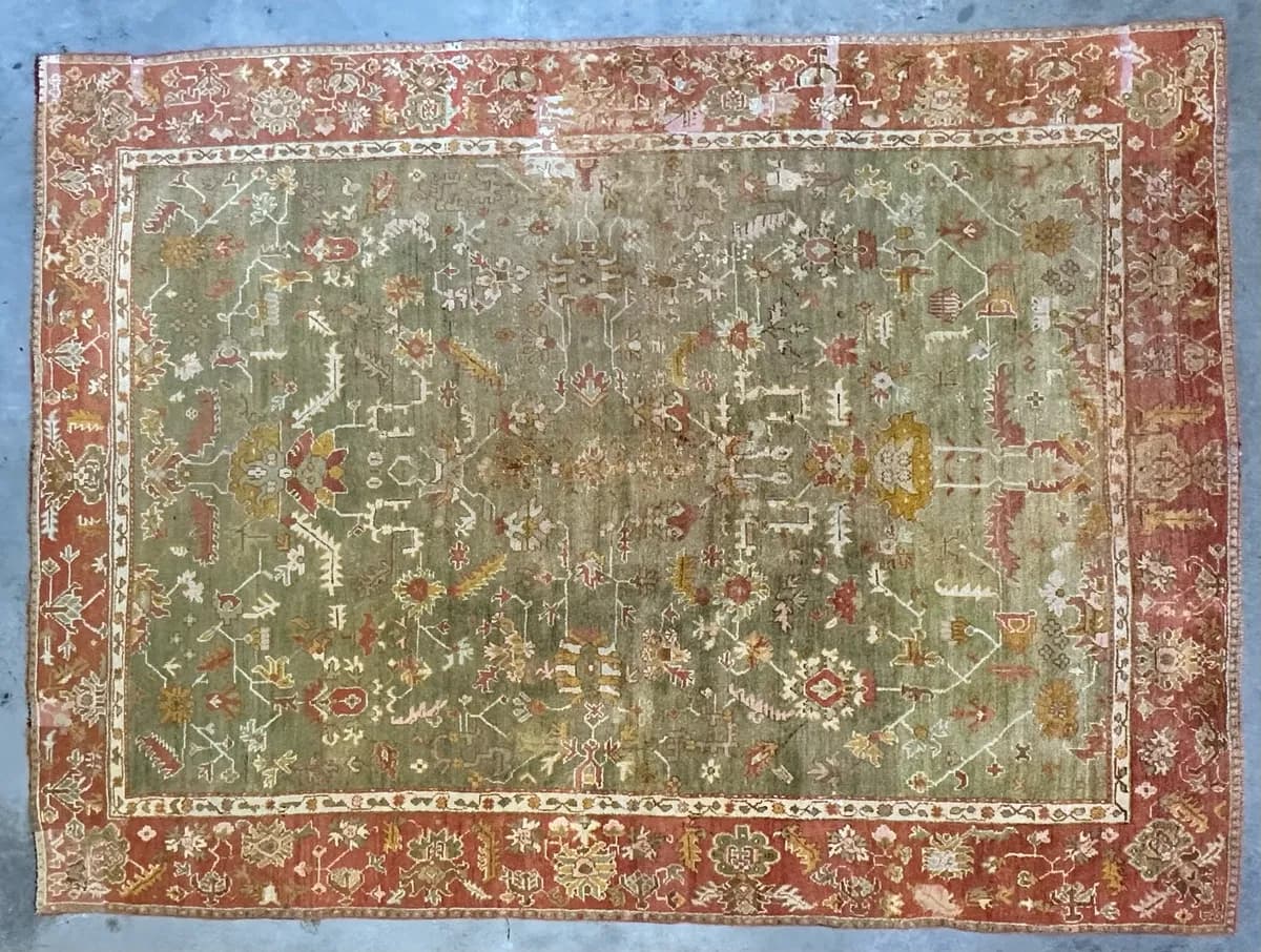 Sun-faded antique wool Oushak rug before color correction — Ahmadi Rug, Wilmette IL