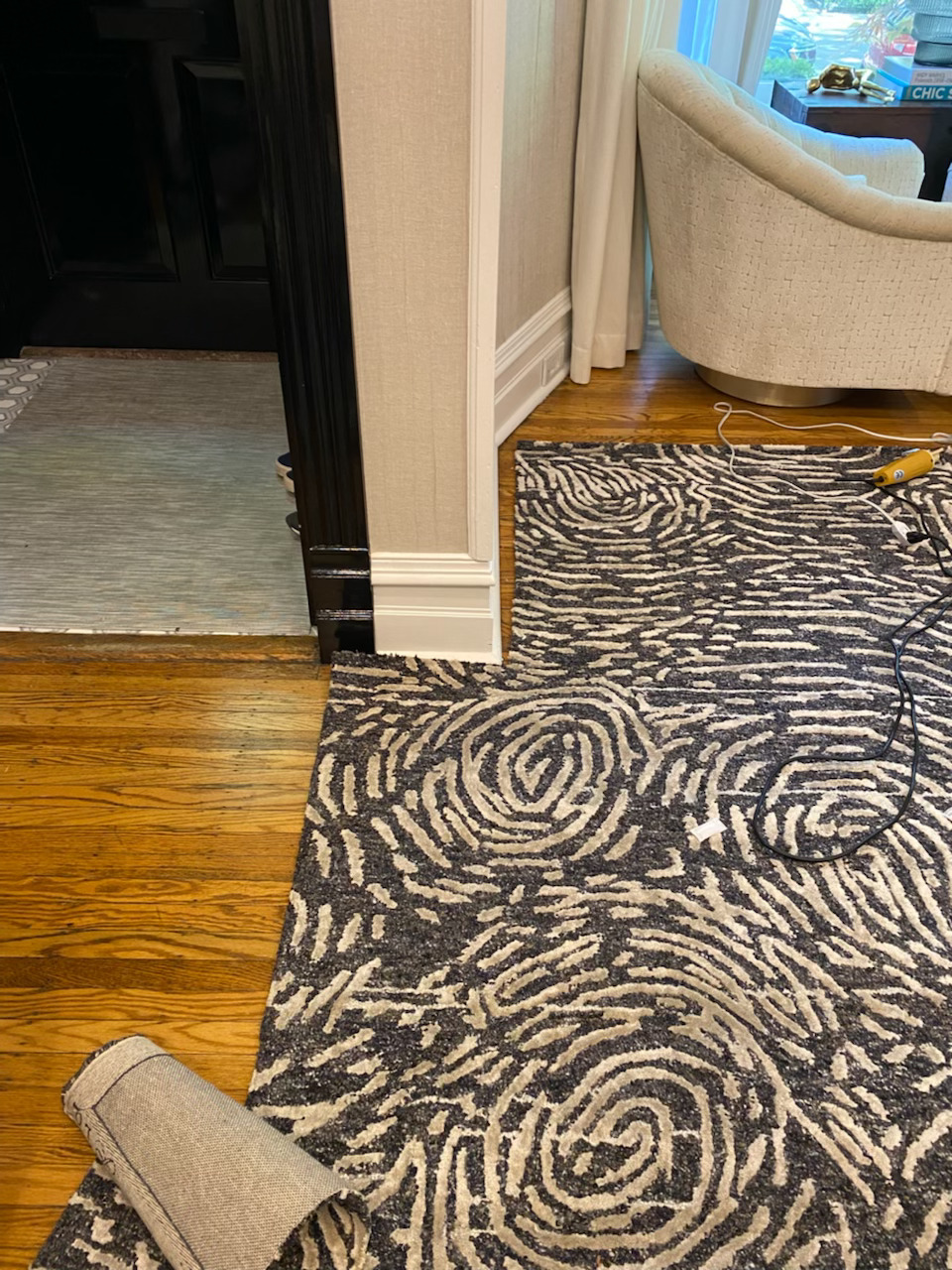 Abstract patterned rug in living room